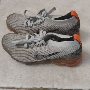 Nike Knit Sneakers with Orange Highlights